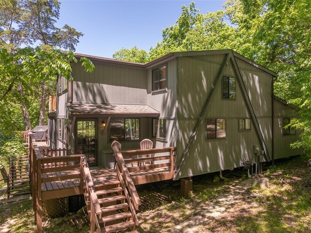 600 Innisfree Lake Dr, Innsbrook, MO 63390 - back of house with stairs and a wooden deck