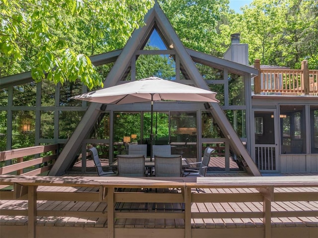 600 Innisfree Lake Dr, Innsbrook, MO 63390 - view of jungle gym with outdoor dining space and a deck