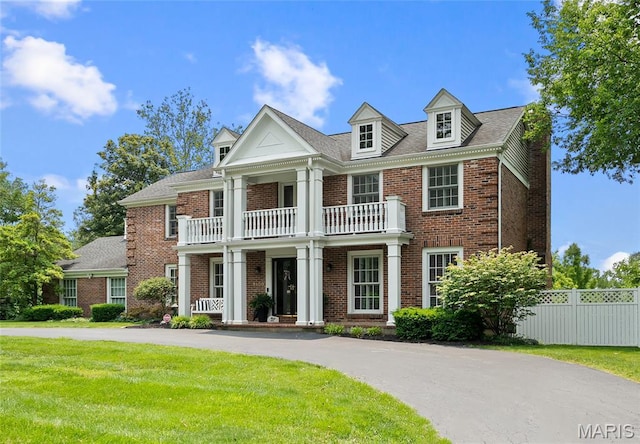 9800 Countryshire Pl, Creve Coeur, MO 63141 - view of front of property with a balcony and brick siding