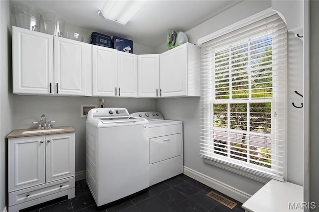 9800 Countryshire Pl, Creve Coeur, MO 63141 - laundry area featuring cabinet space and independent washer and dryer