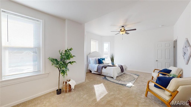 2111 W Main St, Belleville, IL 62226 - carpeted bedroom with baseboards and a ceiling fan