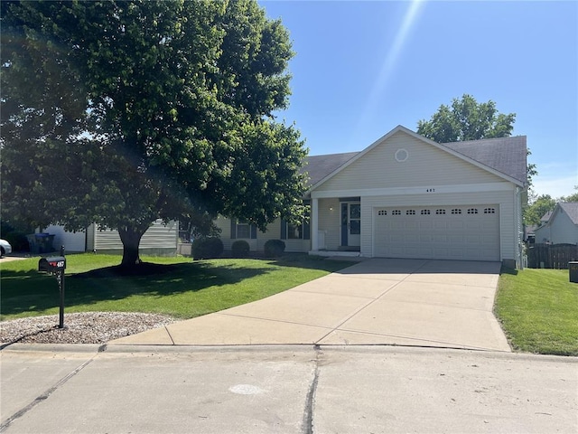 487 Prentice Dr, Ofallon, MO 63376 - view of front of home featuring a garage, a front yard, and driveway