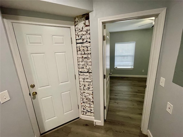 2715 Arkansas Ave, Saint Louis, MO 63118 - hallway with dark wood-type flooring and baseboards
