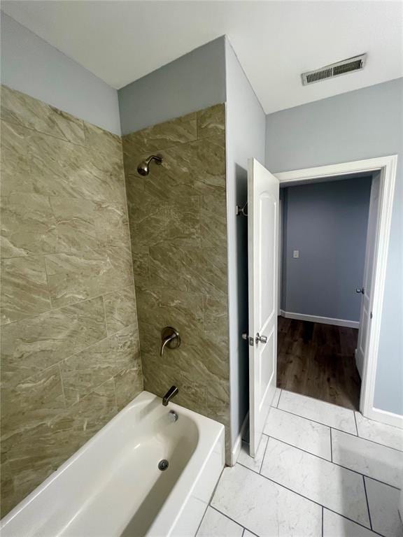 2715 Arkansas Ave, Saint Louis, MO 63118 - full bathroom featuring shower / bath combination and tile patterned flooring