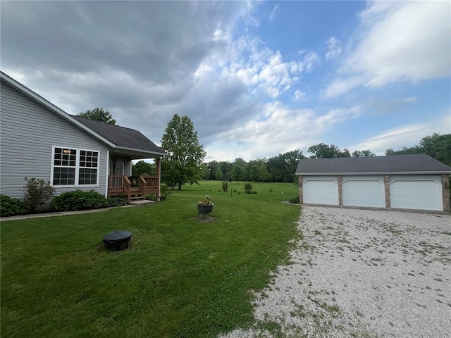 7867 Lebanon Rd, Troy, IL 62294 - view of grassy yard with a garage and an outbuilding