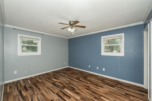 unfurnished room with dark wood-style flooring, healthy amount of natural light, a ceiling fan, baseboards, and ornamental molding