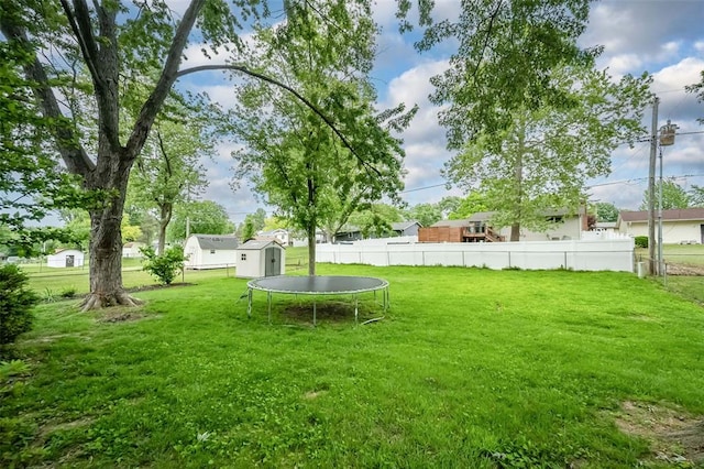 view of yard with a trampoline