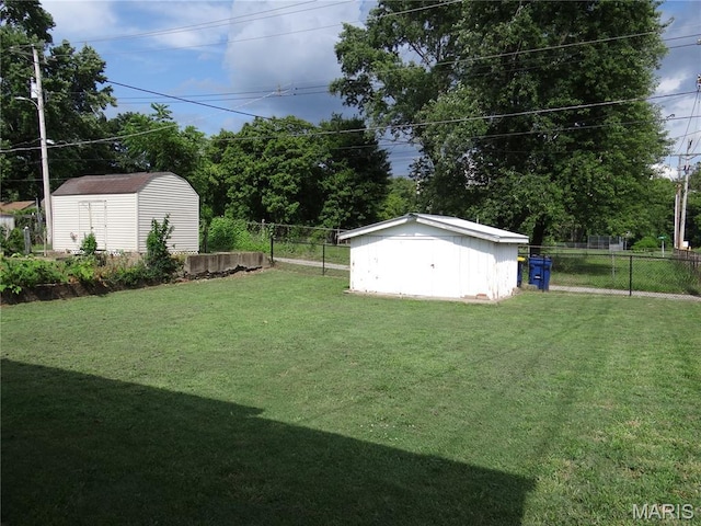 127 E 2nd St, De Soto, MO 63020 - fenced backyard with a storage shed