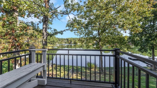 balcony featuring a water view