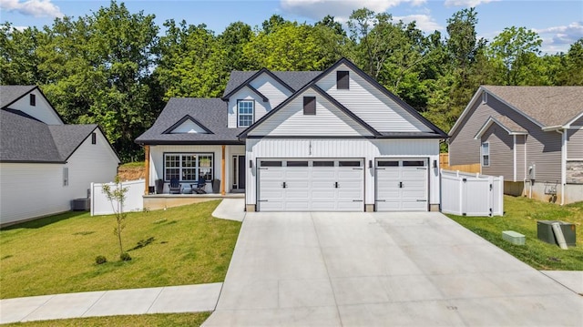 1513 Grey Wolf Dr, Imperial, MO 63052 - view of front of house featuring concrete driveway, an attached garage, and central AC unit