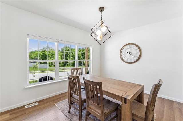 1513 Grey Wolf Dr, Imperial, MO 63052 - dining space with baseboards and light wood-style flooring