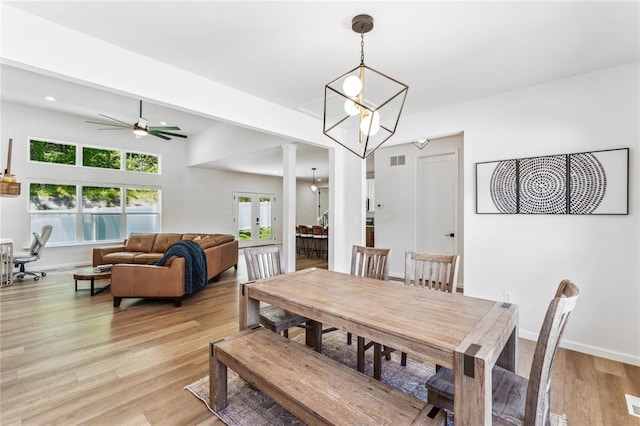 1513 Grey Wolf Dr, Imperial, MO 63052 - dining area with light wood finished floors, ceiling fan, and baseboards