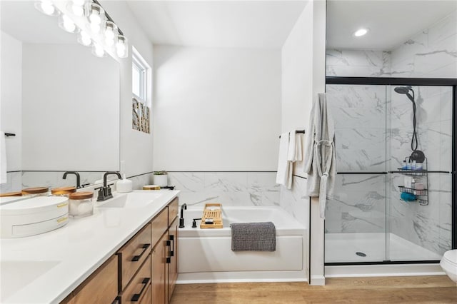 1513 Grey Wolf Dr, Imperial, MO 63052 - full bath featuring a garden tub, double vanity, a marble finish shower, wood finished floors, and recessed lighting