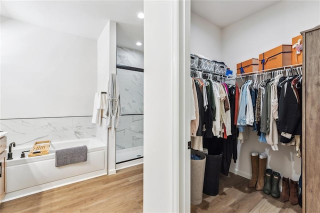 1513 Grey Wolf Dr, Imperial, MO 63052 - spacious closet featuring light wood-style floors