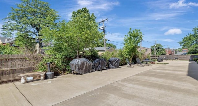 4220 Mcpherson Unit 101, Saint Louis, MO 63108 - view of patio / terrace featuring fence and grilling area