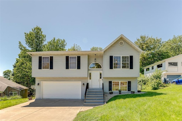 8 Lavadna Ct, Collinsville, IL 62234 - bi-level home with driveway, an attached garage, and a front yard