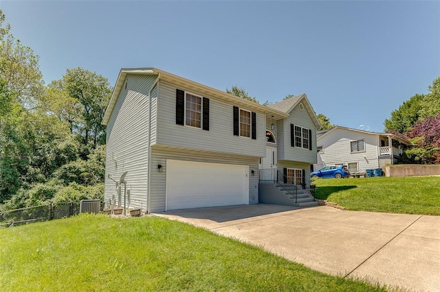 8 Lavadna Ct, Collinsville, IL 62234 - bi-level home with an attached garage, driveway, and central AC