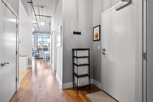 4100 Forest Park Ave Unit 323, Saint Louis, MO 63108 - foyer entrance featuring wood finished floors and baseboards