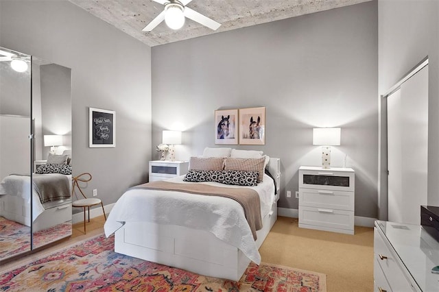 4100 Forest Park Ave Unit 323, Saint Louis, MO 63108 - bedroom with light carpet and baseboards