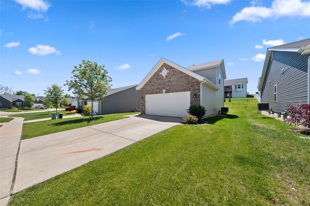 224 Quiet Bend Dr, Wentzville, MO 63385 - view of front facade featuring concrete driveway, a front lawn, an attached garage, and brick siding