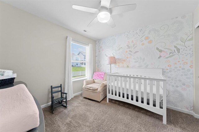 224 Quiet Bend Dr, Wentzville, MO 63385 - carpeted bedroom featuring baseboards, a nursery area, and ceiling fan