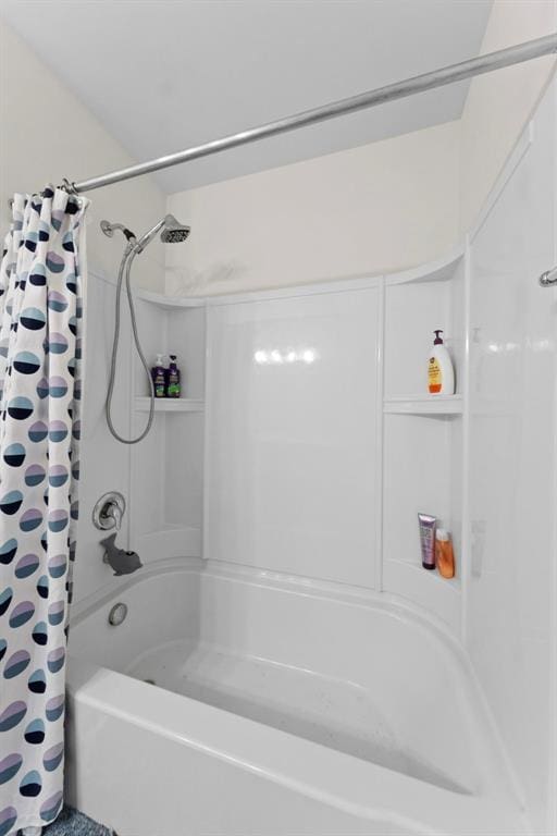 224 Quiet Bend Dr, Wentzville, MO 63385 - bathroom featuring shower / tub combo
