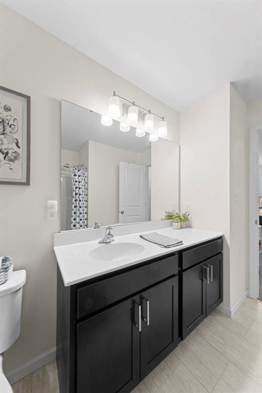 224 Quiet Bend Dr, Wentzville, MO 63385 - full bath with vanity, toilet, and baseboards
