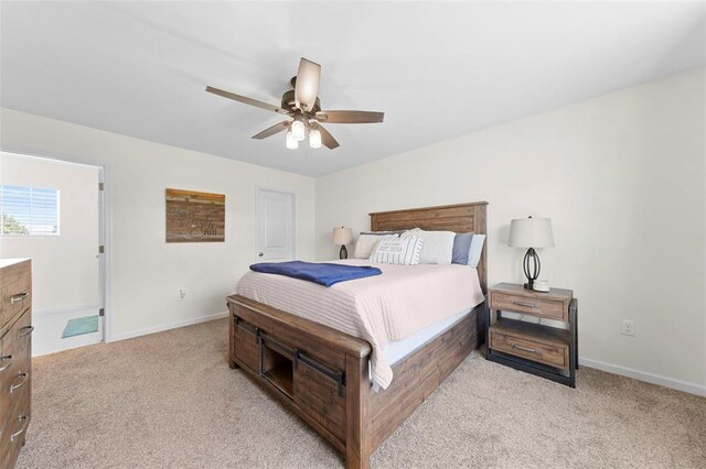 224 Quiet Bend Dr, Wentzville, MO 63385 - bedroom with light colored carpet, baseboards, and ceiling fan