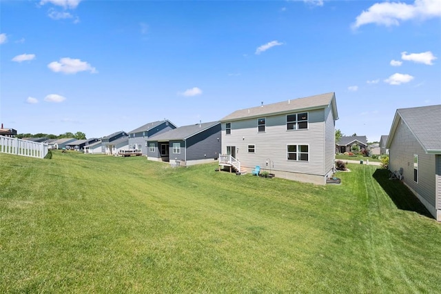 224 Quiet Bend Dr, Wentzville, MO 63385 - back of house featuring a residential view and a yard