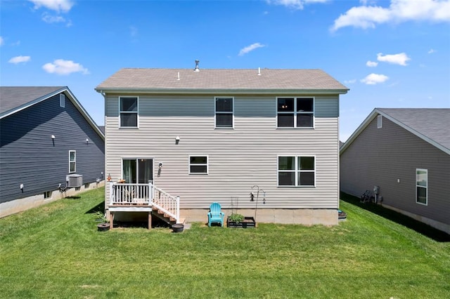 224 Quiet Bend Dr, Wentzville, MO 63385 - rear view of house featuring a lawn and central AC