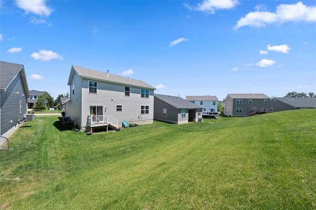 224 Quiet Bend Dr, Wentzville, MO 63385 - back of house with a yard, central air condition unit, and a residential view