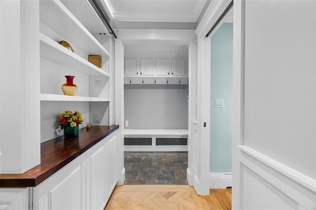 mudroom with crown molding
