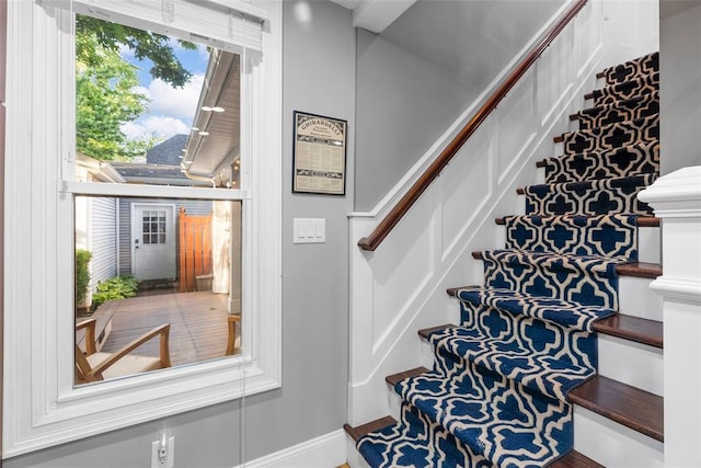 stairs with baseboards