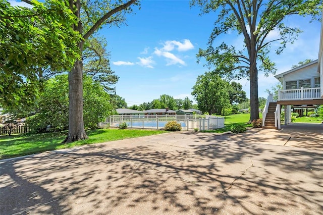 10014 Aldred Dr, Sunset Hills, MO 63128 - view of patio featuring stairs and driveway