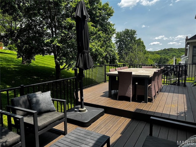 1619 Highland Valley Cir, Wildwood, MO 63005 - deck with outdoor dining area, outdoor lounge area, and a lawn