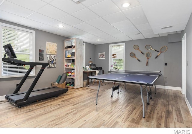 1619 Highland Valley Cir, Wildwood, MO 63005 - game room featuring wood finished floors, a paneled ceiling, plenty of natural light, and recessed lighting