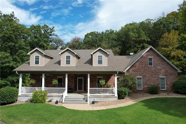 5193 Athlone Ct, Cedar Hill, MO 63016 - cape cod home with brick siding, a front yard, roof with shingles, and covered porch