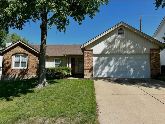 ranch-style home with brick siding, an attached garage, driveway, a front lawn, and a shingled roof