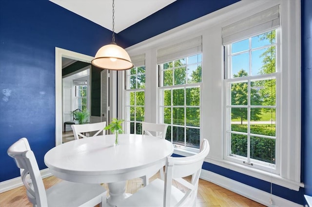 15 Briarcliff Rd, Ladue, MO 63124 - dining area with baseboards and plenty of natural light