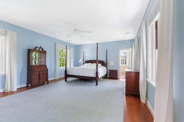 15 Briarcliff Rd, Ladue, MO 63124 - bedroom featuring dark wood-style floors, baseboards, and ceiling fan