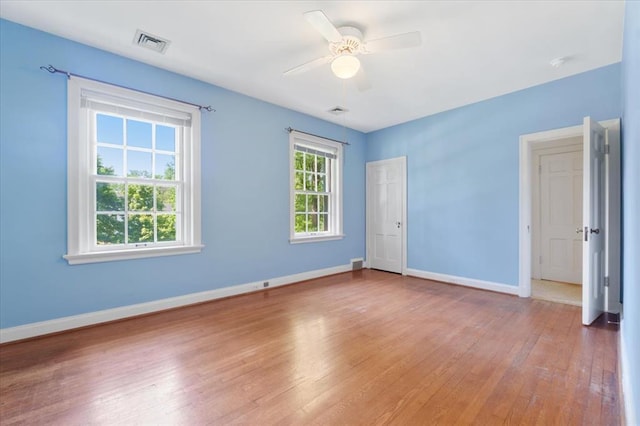 15 Briarcliff Rd, Ladue, MO 63124 - empty room featuring baseboards, hardwood / wood-style floors, and a ceiling fan