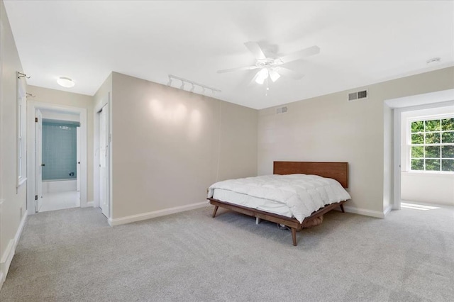 15 Briarcliff Rd, Ladue, MO 63124 - carpeted bedroom featuring baseboards and a ceiling fan