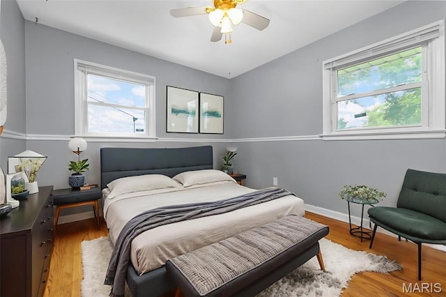 165 Saint Daniel Ln, Florissant, MO 63031 - bedroom with light wood-type flooring, baseboards, and a ceiling fan
