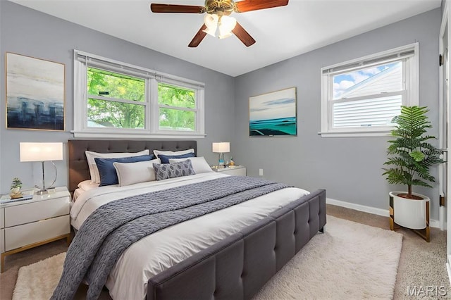 165 Saint Daniel Ln, Florissant, MO 63031 - bedroom featuring multiple windows, baseboards, and a ceiling fan
