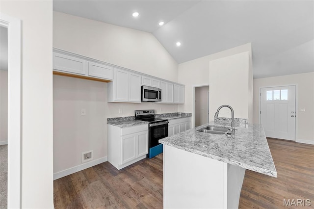 280 Railroad St, Moscow Mills, MO 63362 - kitchen featuring stainless steel appliances, light stone counters, dark wood-type flooring, white cabinets, and recessed lighting