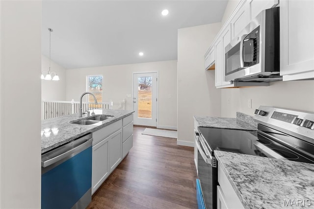 280 Railroad St, Moscow Mills, MO 63362 - kitchen featuring stainless steel appliances, dark wood finished floors, white cabinetry, a chandelier, and light stone counters