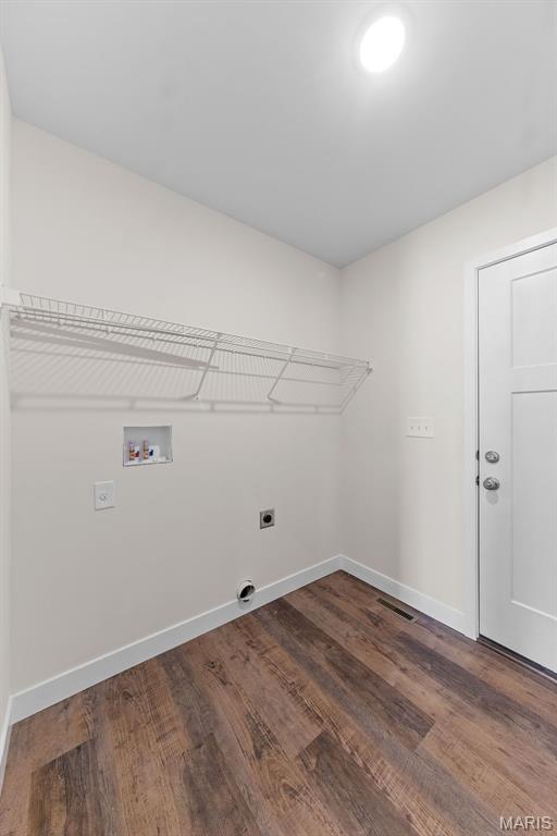 280 Railroad St, Moscow Mills, MO 63362 - laundry area with electric dryer hookup, wood finished floors, and washer hookup