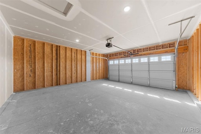 280 Railroad St, Moscow Mills, MO 63362 - garage featuring a garage door opener and recessed lighting