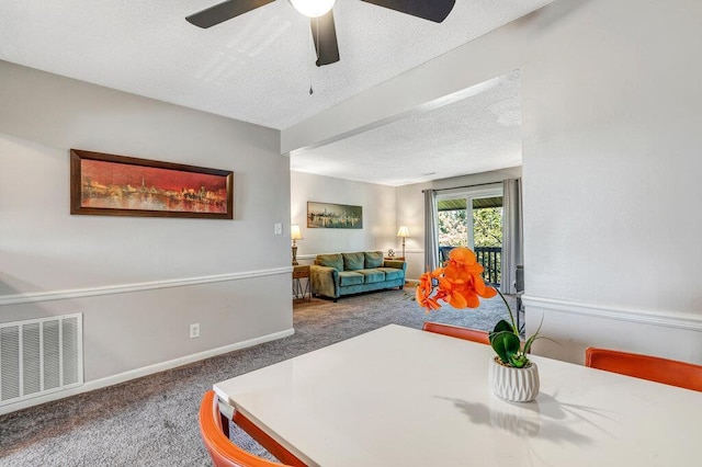 1843 Gascony Parc Dr Unit 1843, Lake St Louis, MO 63367 - carpeted dining room featuring a textured ceiling, ceiling fan, and baseboards