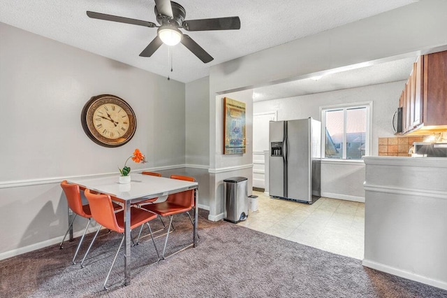 1843 Gascony Parc Dr Unit 1843, Lake St Louis, MO 63367 - dining space featuring a ceiling fan, baseboards, a textured ceiling, and light carpet